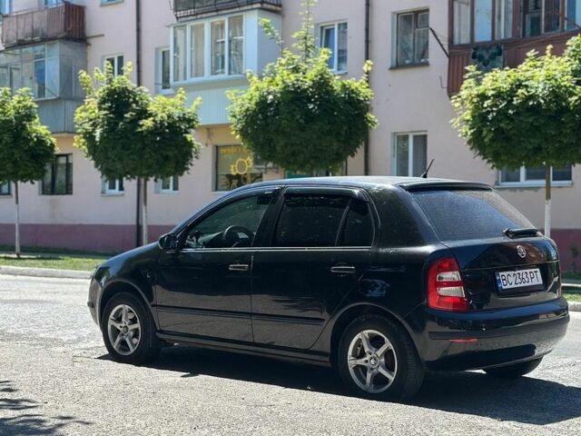 Черный Шкода Фабия, объемом двигателя 1.2 л и пробегом 240 тыс. км за 3200 $, фото 5 на Automoto.ua