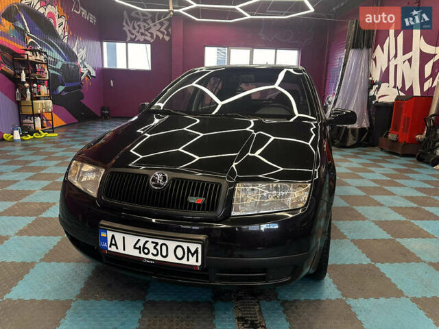 Черный Шкода Фабия, объемом двигателя 1.39 л и пробегом 275 тыс. км за 3999 $, фото 20 на Automoto.ua
