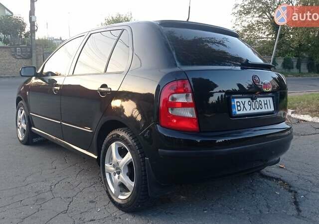 Черный Шкода Фабия, объемом двигателя 1.2 л и пробегом 260 тыс. км за 3450 $, фото 2 на Automoto.ua