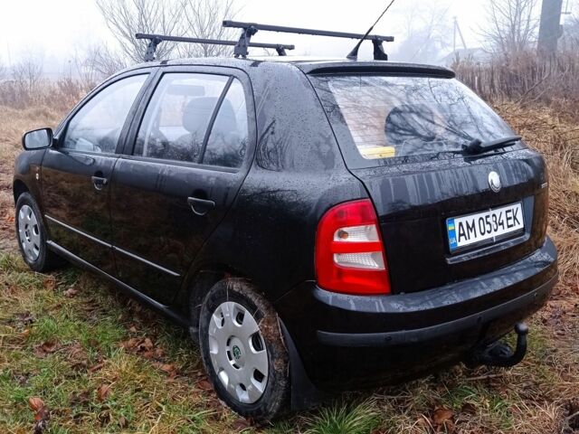 Черный Шкода Фабия, объемом двигателя 1.4 л и пробегом 260 тыс. км за 3350 $, фото 3 на Automoto.ua