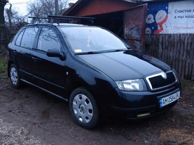 Черный Шкода Фабия, объемом двигателя 1.4 л и пробегом 260 тыс. км за 3350 $, фото 2 на Automoto.ua