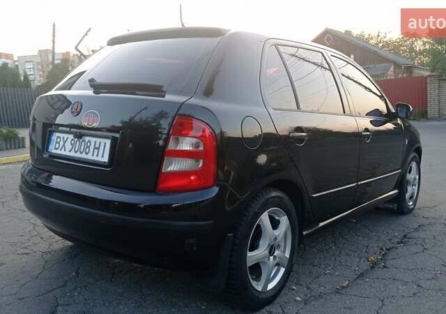 Черный Шкода Фабия, объемом двигателя 1.2 л и пробегом 260 тыс. км за 3450 $, фото 3 на Automoto.ua