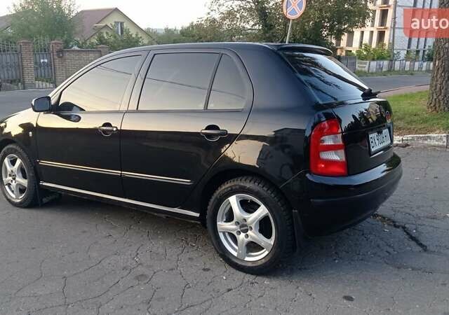 Черный Шкода Фабия, объемом двигателя 1.2 л и пробегом 260 тыс. км за 3450 $, фото 8 на Automoto.ua