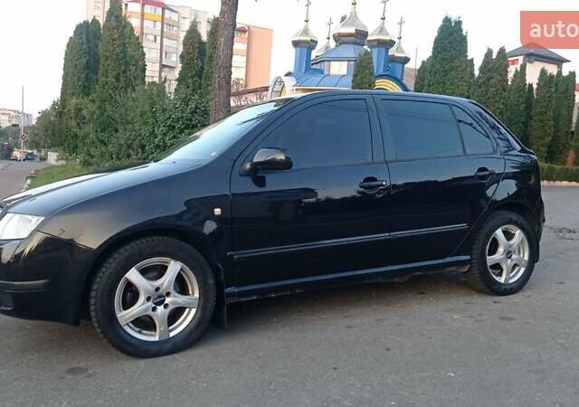 Черный Шкода Фабия, объемом двигателя 1.2 л и пробегом 260 тыс. км за 3450 $, фото 4 на Automoto.ua