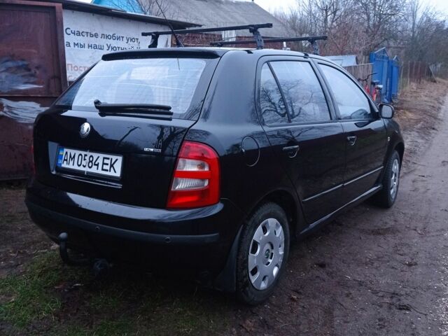 Черный Шкода Фабия, объемом двигателя 1.4 л и пробегом 260 тыс. км за 3350 $, фото 4 на Automoto.ua
