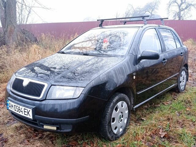 Черный Шкода Фабия, объемом двигателя 1.4 л и пробегом 260 тыс. км за 3350 $, фото 1 на Automoto.ua