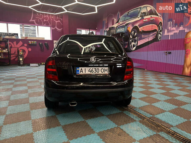 Черный Шкода Фабия, объемом двигателя 1.39 л и пробегом 275 тыс. км за 3999 $, фото 15 на Automoto.ua