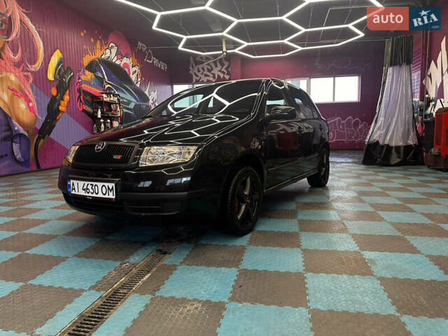 Черный Шкода Фабия, объемом двигателя 1.39 л и пробегом 275 тыс. км за 3999 $, фото 22 на Automoto.ua