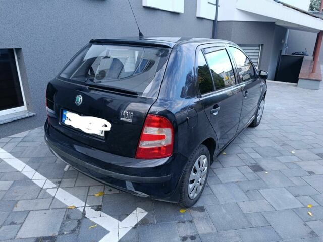 Черный Шкода Фабия, объемом двигателя 1.2 л и пробегом 277 тыс. км за 3500 $, фото 1 на Automoto.ua