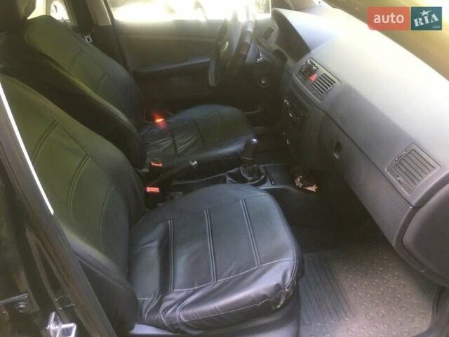 Черный Шкода Фабия, объемом двигателя 1.2 л и пробегом 201 тыс. км за 4500 $, фото 6 на Automoto.ua