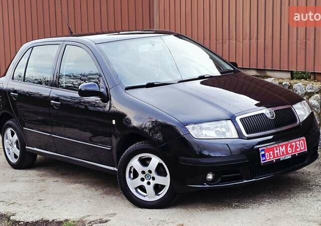 Черный Шкода Фабия, объемом двигателя 1.39 л и пробегом 173 тыс. км за 5799 $, фото 9 на Automoto.ua