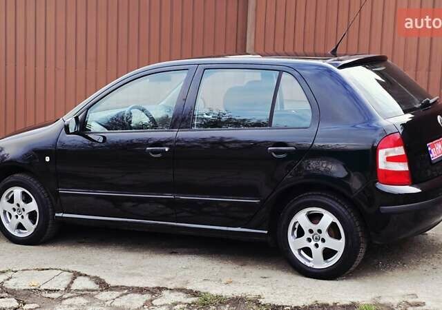 Черный Шкода Фабия, объемом двигателя 1.39 л и пробегом 173 тыс. км за 5799 $, фото 29 на Automoto.ua