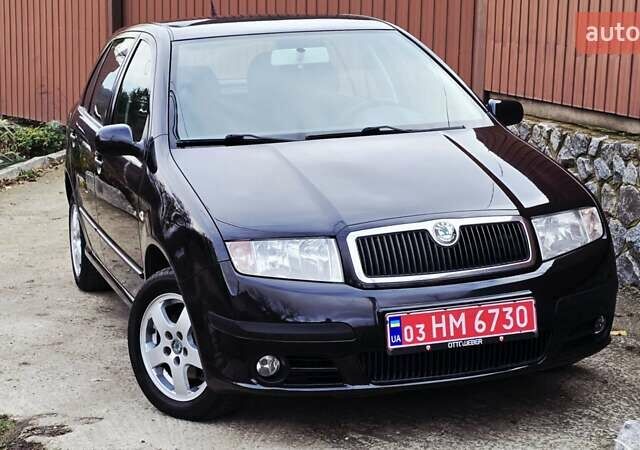 Черный Шкода Фабия, объемом двигателя 1.39 л и пробегом 173 тыс. км за 5799 $, фото 6 на Automoto.ua