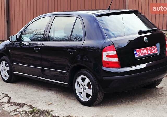 Черный Шкода Фабия, объемом двигателя 1.39 л и пробегом 173 тыс. км за 5799 $, фото 27 на Automoto.ua