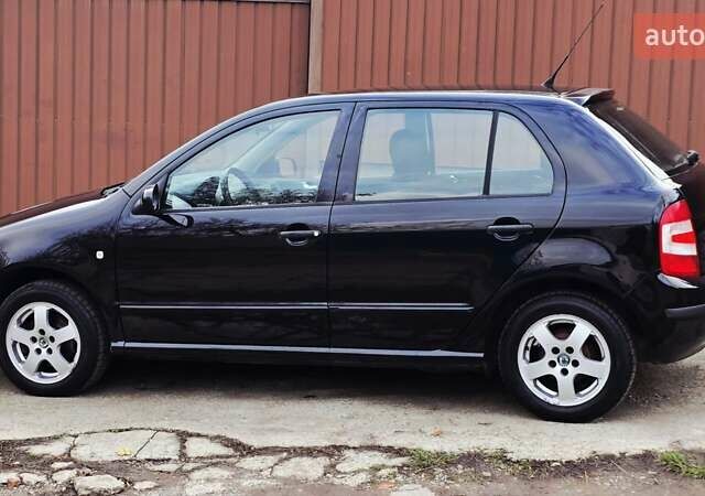 Черный Шкода Фабия, объемом двигателя 1.39 л и пробегом 173 тыс. км за 5799 $, фото 30 на Automoto.ua