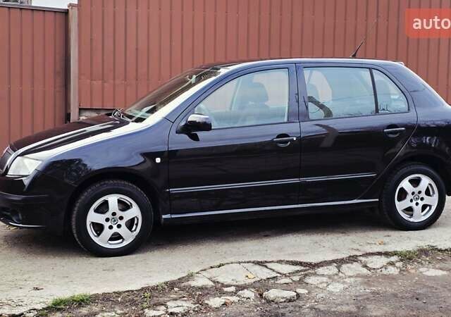 Черный Шкода Фабия, объемом двигателя 1.39 л и пробегом 173 тыс. км за 5799 $, фото 32 на Automoto.ua