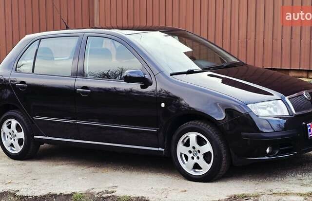 Черный Шкода Фабия, объемом двигателя 1.39 л и пробегом 173 тыс. км за 5799 $, фото 11 на Automoto.ua