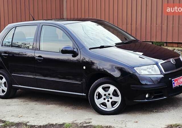 Черный Шкода Фабия, объемом двигателя 1.39 л и пробегом 173 тыс. км за 5799 $, фото 14 на Automoto.ua