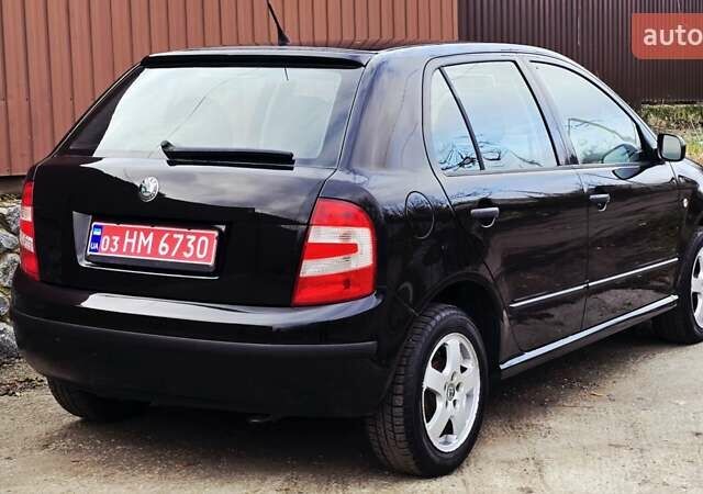 Черный Шкода Фабия, объемом двигателя 1.39 л и пробегом 173 тыс. км за 5799 $, фото 19 на Automoto.ua
