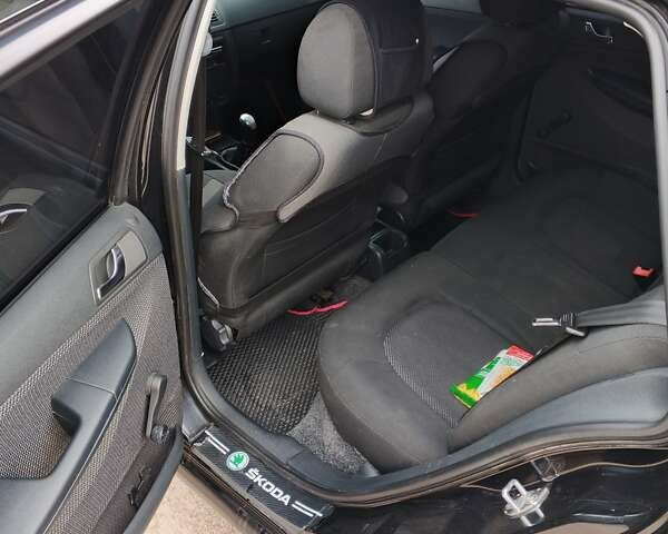 Черный Шкода Фабия, объемом двигателя 1.39 л и пробегом 229 тыс. км за 4350 $, фото 15 на Automoto.ua