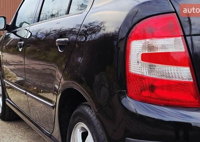 Черный Шкода Фабия, объемом двигателя 1.39 л и пробегом 173 тыс. км за 5799 $, фото 23 на Automoto.ua