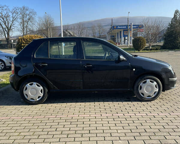 Черный Шкода Фабия, объемом двигателя 1.2 л и пробегом 300 тыс. км за 3500 $, фото 6 на Automoto.ua