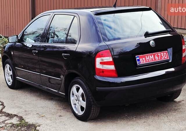 Черный Шкода Фабия, объемом двигателя 1.39 л и пробегом 173 тыс. км за 5799 $, фото 26 на Automoto.ua