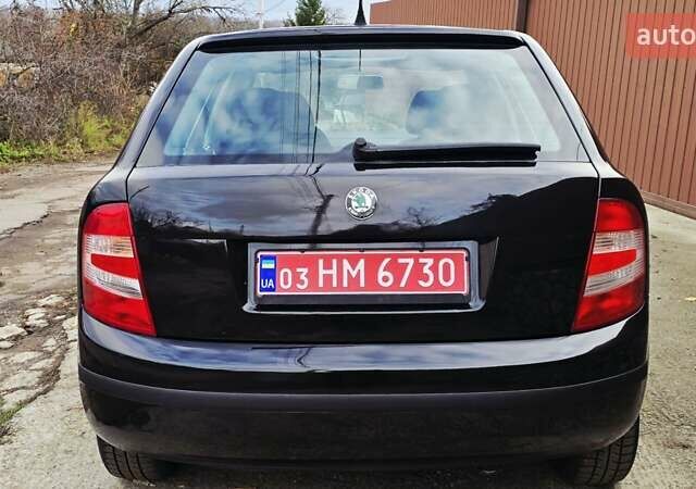 Черный Шкода Фабия, объемом двигателя 1.39 л и пробегом 173 тыс. км за 5799 $, фото 22 на Automoto.ua