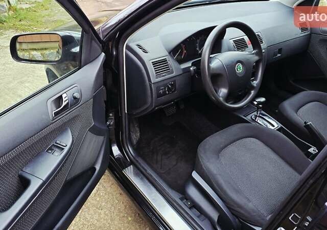 Черный Шкода Фабия, объемом двигателя 1.39 л и пробегом 173 тыс. км за 5799 $, фото 41 на Automoto.ua