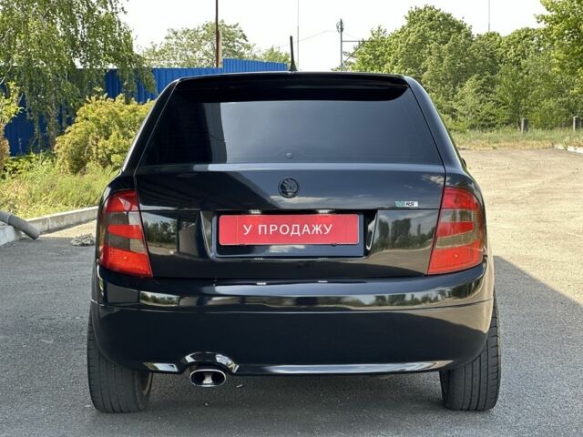 Черный Шкода Фабия, объемом двигателя 1.9 л и пробегом 265 тыс. км за 6599 $, фото 2 на Automoto.ua