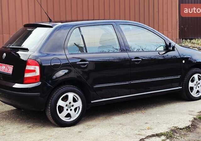 Черный Шкода Фабия, объемом двигателя 1.39 л и пробегом 173 тыс. км за 5799 $, фото 17 на Automoto.ua