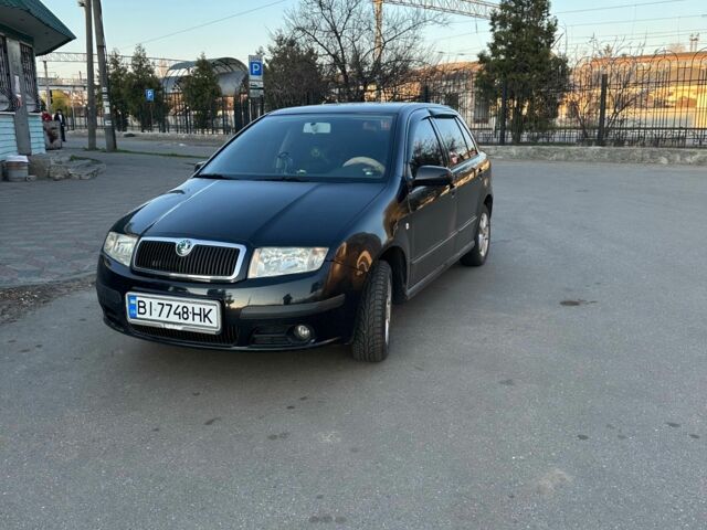 Черный Шкода Фабия, объемом двигателя 1.4 л и пробегом 245 тыс. км за 4000 $, фото 2 на Automoto.ua