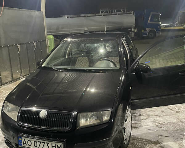 Черный Шкода Фабия, объемом двигателя 1.2 л и пробегом 300 тыс. км за 3500 $, фото 9 на Automoto.ua