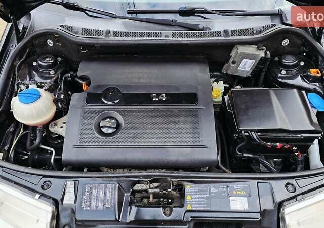 Черный Шкода Фабия, объемом двигателя 1.39 л и пробегом 173 тыс. км за 5799 $, фото 2 на Automoto.ua