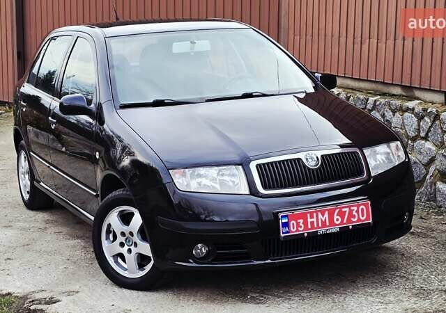 Черный Шкода Фабия, объемом двигателя 1.39 л и пробегом 173 тыс. км за 5799 $, фото 7 на Automoto.ua