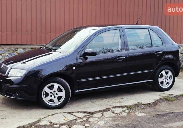 Черный Шкода Фабия, объемом двигателя 1.39 л и пробегом 173 тыс. км за 5799 $, фото 34 на Automoto.ua