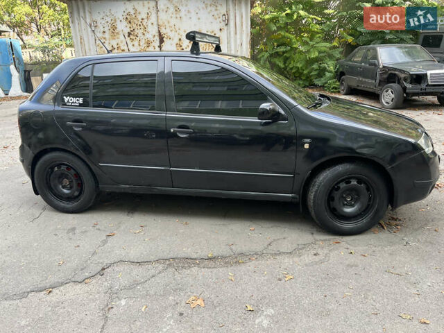 Черный Шкода Фабия, объемом двигателя 1.9 л и пробегом 290 тыс. км за 3300 $, фото 3 на Automoto.ua