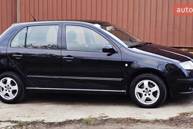Черный Шкода Фабия, объемом двигателя 1.39 л и пробегом 173 тыс. км за 5799 $, фото 13 на Automoto.ua