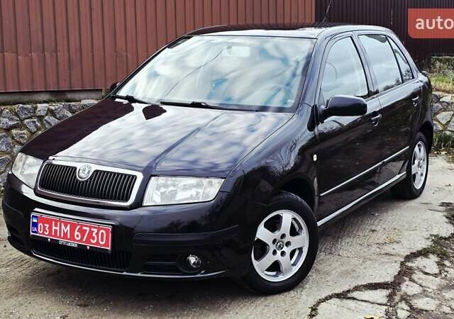Черный Шкода Фабия, объемом двигателя 1.39 л и пробегом 173 тыс. км за 5799 $, фото 3 на Automoto.ua