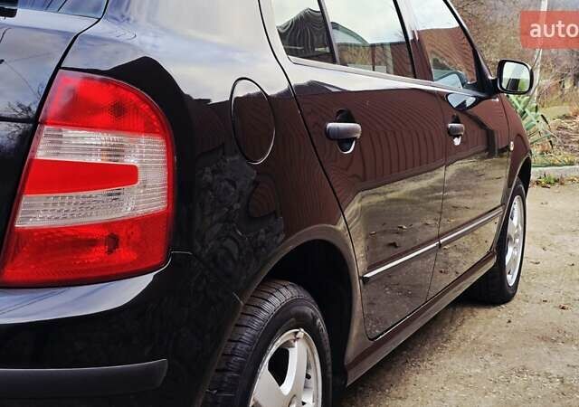 Черный Шкода Фабия, объемом двигателя 1.39 л и пробегом 173 тыс. км за 5799 $, фото 21 на Automoto.ua