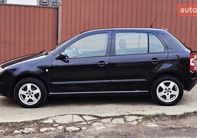 Черный Шкода Фабия, объемом двигателя 1.39 л и пробегом 173 тыс. км за 5799 $, фото 31 на Automoto.ua