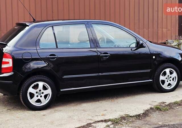 Черный Шкода Фабия, объемом двигателя 1.39 л и пробегом 173 тыс. км за 5799 $, фото 16 на Automoto.ua