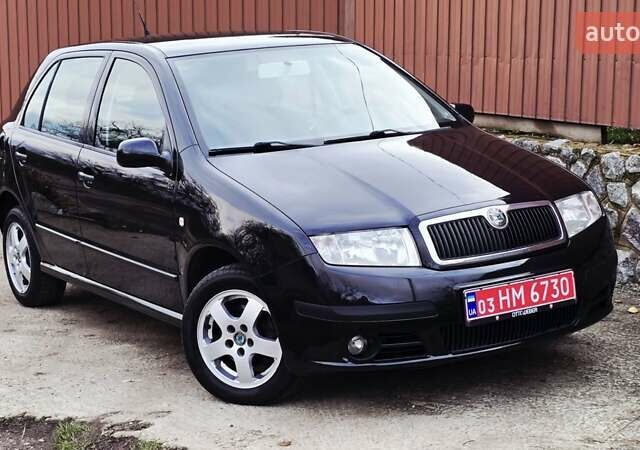 Черный Шкода Фабия, объемом двигателя 1.39 л и пробегом 173 тыс. км за 5799 $, фото 8 на Automoto.ua