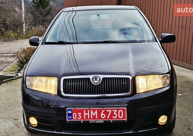 Черный Шкода Фабия, объемом двигателя 1.39 л и пробегом 173 тыс. км за 5799 $, фото 5 на Automoto.ua