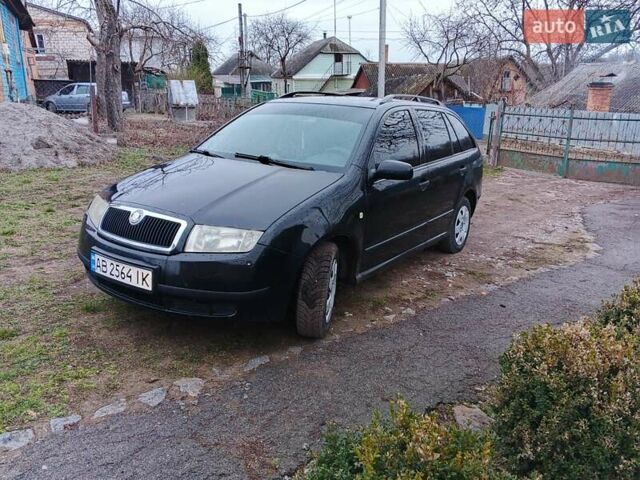Черный Шкода Фабия, объемом двигателя 1.39 л и пробегом 229 тыс. км за 4350 $, фото 7 на Automoto.ua