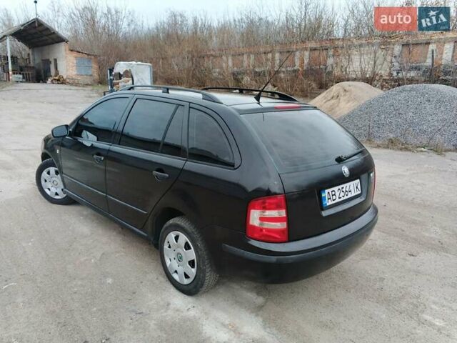 Черный Шкода Фабия, объемом двигателя 1.39 л и пробегом 229 тыс. км за 4350 $, фото 6 на Automoto.ua