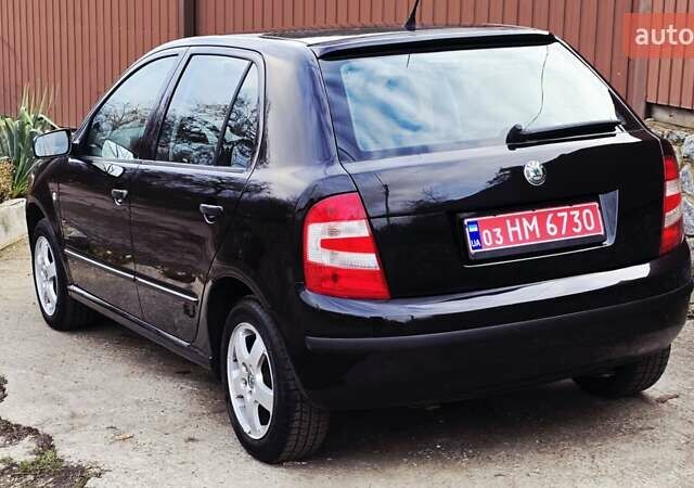 Черный Шкода Фабия, объемом двигателя 1.39 л и пробегом 173 тыс. км за 5799 $, фото 25 на Automoto.ua