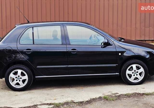 Черный Шкода Фабия, объемом двигателя 1.39 л и пробегом 173 тыс. км за 5799 $, фото 15 на Automoto.ua