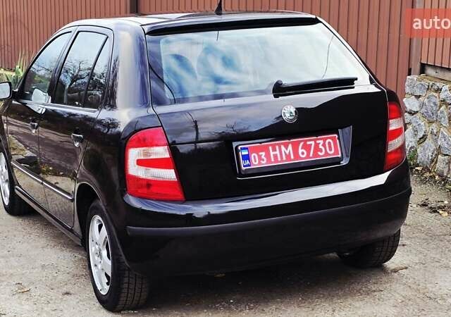 Черный Шкода Фабия, объемом двигателя 1.39 л и пробегом 173 тыс. км за 5799 $, фото 24 на Automoto.ua