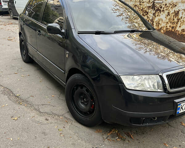 Черный Шкода Фабия, объемом двигателя 1.9 л и пробегом 290 тыс. км за 3300 $, фото 2 на Automoto.ua